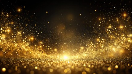 Obraz premium Abstract magic gold dust background over black. Beautiful golden art widescreen background , magic, gold dust, abstract