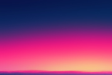 Naklejka premium Vibrant pink and yellow sunset fading into a deep blue sky