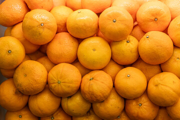 Fresh Ripe Oranges Piled Together