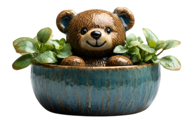 a teddy bear in a bowl with plants. 