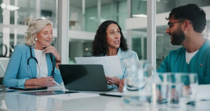 Documents, medical and teamwork with people in boardroom of hospital for meeting, planning or research. Doctors, healthcare and nurses with professional medicine group in clinic for coaching