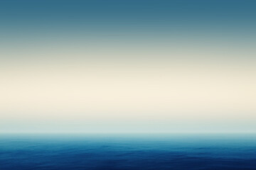 Serene ocean view with calm water and misty sky