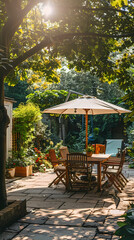 London garden in summer with patio, wooden garden furniture and a parasol or sun umbrella