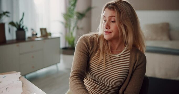 Woman, tired and bored with mobile phone, message or bad news in bedroom or home office as student. Female person, fatigue and burnout with communication on technology in working or research for exam