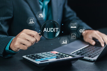 Audit business, Businessman using laptop with audit icon for financial examination for business and financial management system. Compliance with internal organization financial services regulation.