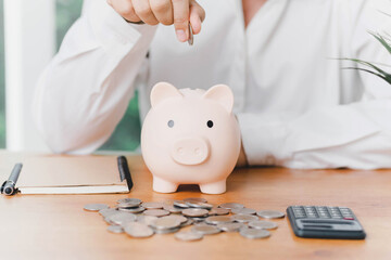 Concepts of saving money and financial planning. Savings money concept, Man hand holding piggy bank...