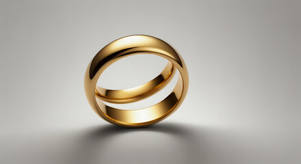A gold wedding ring on a plain white isolated background