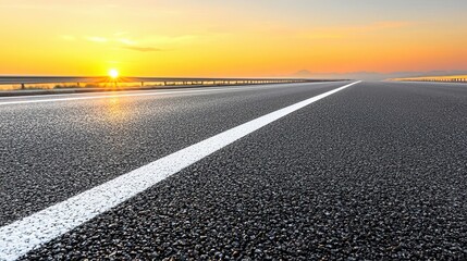 Naklejka premium Asphalt Road with White Line at Sunset
