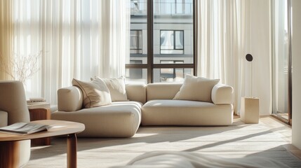 Bright and airy living room with a neutral color palette, featuring designer furniture, large windows, and soft, plush textiles