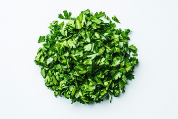 Fototapeta premium Freshly chopped parsley arranged in a circular pile, ideal for culinary use and food presentation.