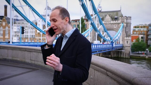 Middle aged man in a argument on his phone in London England