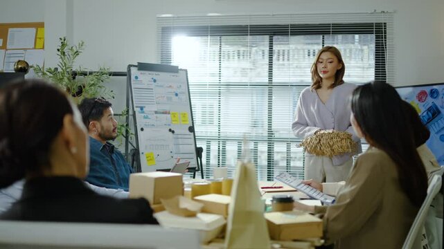 Asian business team discussion reusable product in office, start up eco-friendly business, environmental protection, sustainable business model, ESG strategy, meeting, warming social issues project