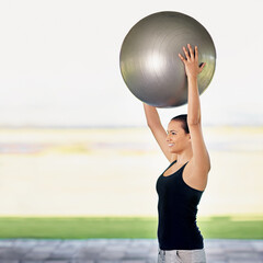 Fototapeta premium Outdoor, woman and happy with exercise ball for fitness, balance and workout for health. Profile, female person and smile or positive with equipment for training with self care and wellbeing