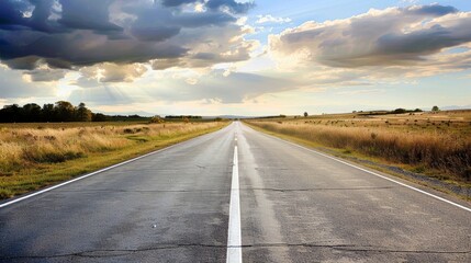 Fototapeta premium An endless road stretching toward the horizon, symbolizing the journey to achieving success.