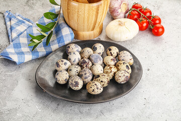Raw quail eggs in the bowl