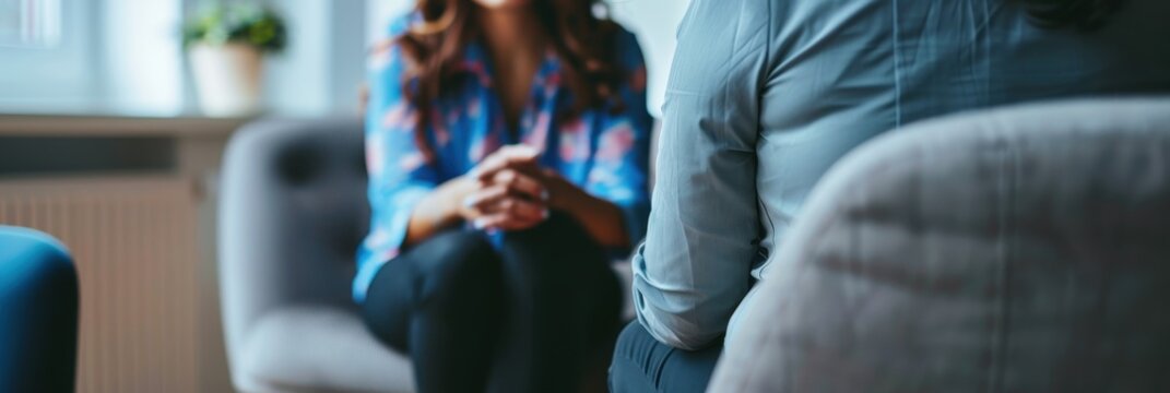 Professional psychologist engaging in a therapeutic session with a client in a cozy office environment
