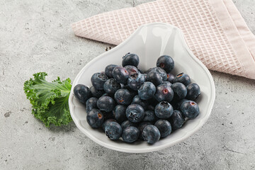 Sweet ripe blueberry on the bowl