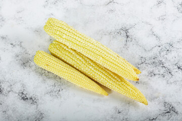 Raw sweet baby corn heap