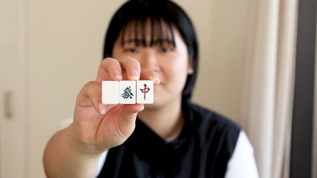 woman holding card