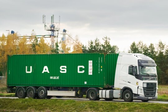 14.09.2024 Poland, Europe. Semi-truck hauling United Arab Shipping Company (UASC) cargo container outdoors