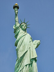 Fototapeta premium The Statue of Liberty Enlightening the World. Usa National Monument. Recognized as a universal symbol of freedom and democracy. National Park Service.