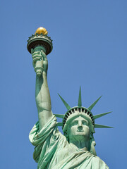 Fototapeta premium The Statue of Liberty Enlightening the World. Usa National Monument. Recognized as a universal symbol of freedom and democracy. National Park Service.