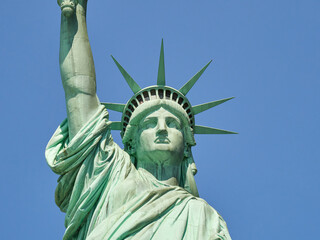Fototapeta premium The Statue of Liberty Enlightening the World. Usa National Monument. Recognized as a universal symbol of freedom and democracy. National Park Service.