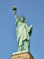 Fototapeta premium The Statue of Liberty Enlightening the World. Usa National Monument. Recognized as a universal symbol of freedom and democracy. National Park Service.