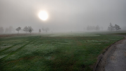Fototapeta premium Sunrise on a golf course in the province of Quebec in Canada