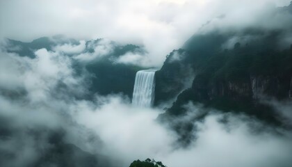 Fototapeta premium the distance, there is an ethereal, dark and mysterious white waterfall on top of floating mountains