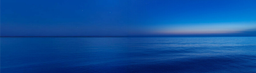 Obraz premium blue sky and sea in the night