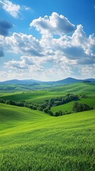 Serene Landscape of Green Field and Rolling Hills Under Blue Sky with White Clouds