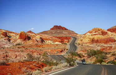 Motorbike on road in Valley of Fire State Park, Nevada, USA