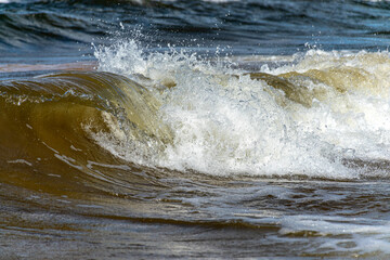 seascape, storm at sea, white waves crashing against the shore, Baltic Sea coast, Latvia