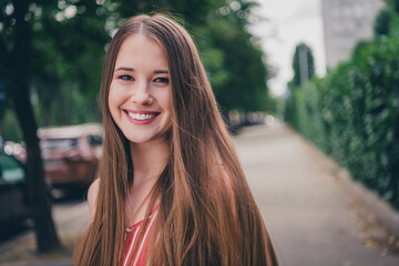 Portrait of adorable charming girl wear trendy clothes walk city summer trip good mood outdoors