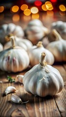 Obraz premium Whole garlic bulbs on wooden surface with blurred background, immune-boosting food