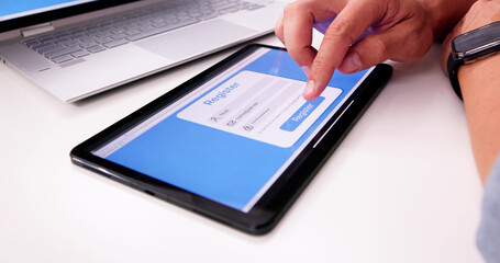 Businessman's Hand Filing Online Registration Form