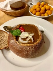 Soup Gulasch in bread 