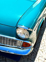 Fototapeta premium Exterior and headlight of vintage blue car