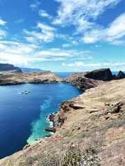 Landscape of the island of Madeira with an ocean bay and mountain cliffs