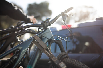 Mtb bike secured rear car ute tie rope travel explore cycle