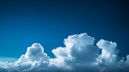  A blue sky backdrops a groupless planes in the foreground, encircled by clouds
