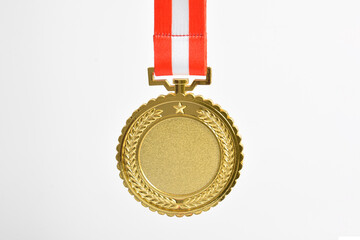 Gold medal with red and white ribbon isolated on white background. First place winner athlete....