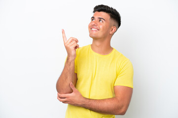 Young caucasian handsome man isolated on white background pointing up a great idea