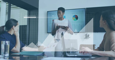 Image of financial data processing over diverse colleagues discussing work in office