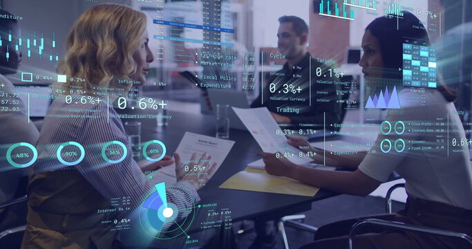 Image of diagrams and data processing over diverse colleagues discussing work in office