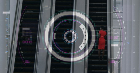 Image of data processing and scope scanning over diverse businesswomen using escalator