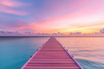 Obraz premium A brightly colored wooden boardwalk stretches over a calm beach