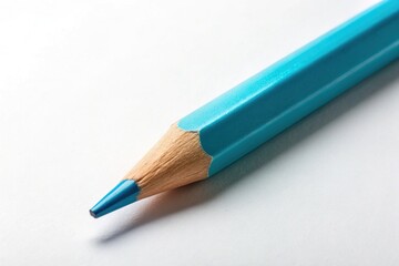 A solitary light blue graphite pencil lies diagonally on a crisp white background, its pointed tip and gentle curves evoking creativity and simplicity.