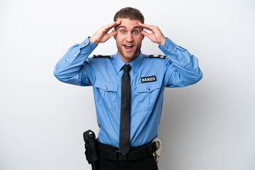 Young police caucasian man isolated on white background with surprise expression